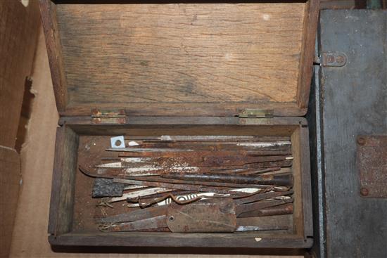 A collection of carpentry and bookbinding tools